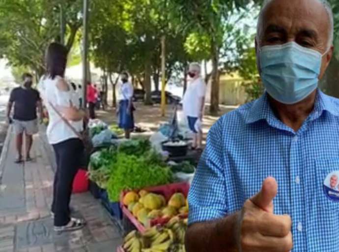 Sem barracas montadas, feirantes vendem produtos em calçada
